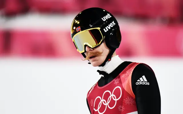 Robert Johansson and his mustache lead the way in the men's ski jumping.