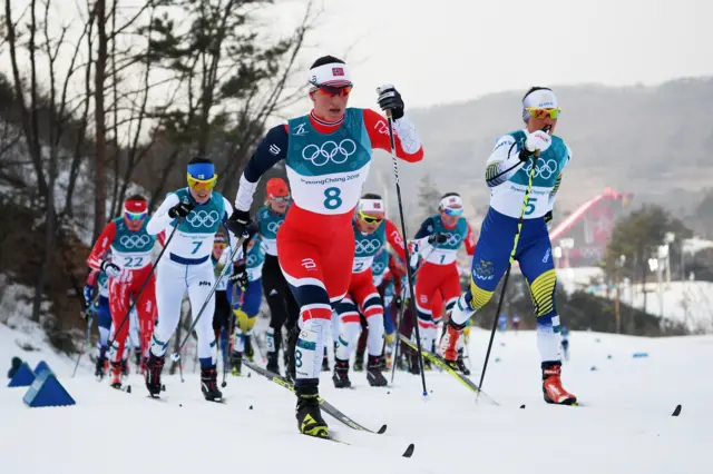 Marit Bjoergen, of Norway, heads the leading group