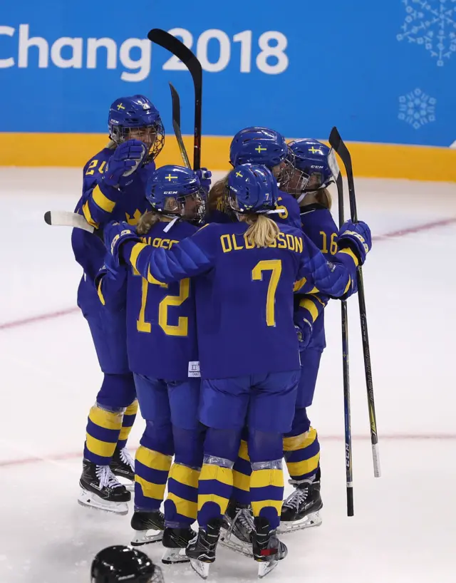 Sweden celebrate their second goal against Japan