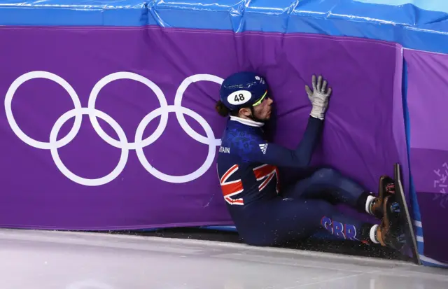 Great Britain's Farrell Treacy falls in the Short Track Speed Skating