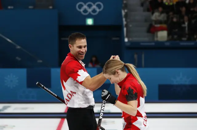 Canada Mixed Doubles Curling Team celebrate