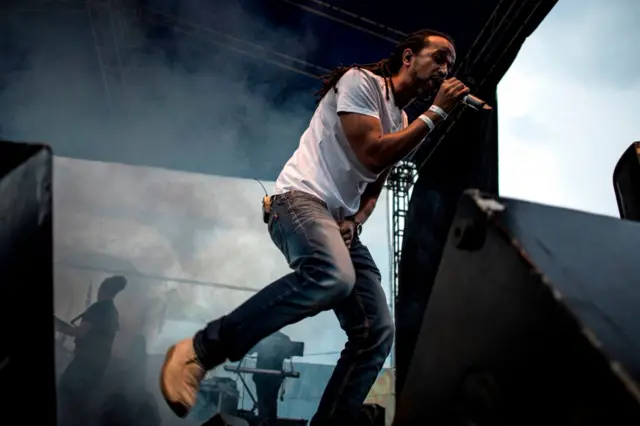 French reggae group Dub Inc singer Aurelien Zohou performs during the Amani Festival on February 10, 2018 in Goma. The Amami Festival runs from Febraury 9 to 11, promoting peace and culture in eastern Democratic Republic of Congo and Great Lakes region.