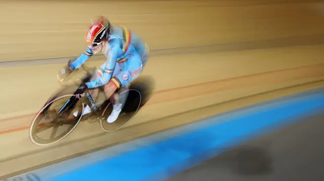 Cyclist in velodrome