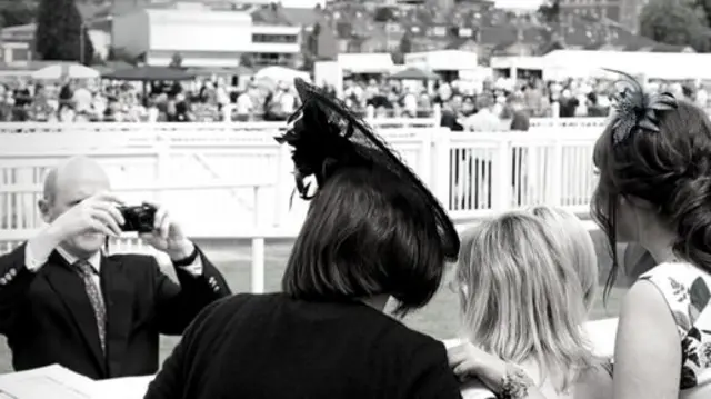 A photo being taken at racecourse