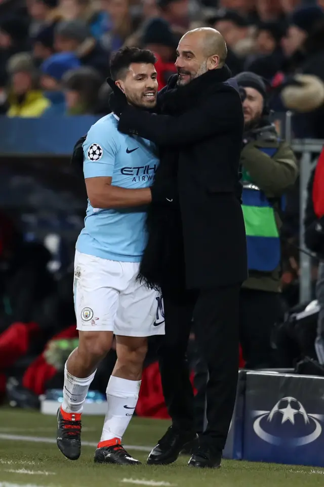 Aguero celebrates with his manager