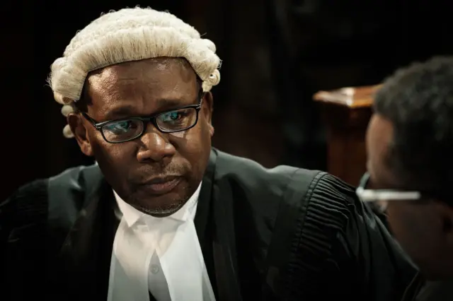 Githu Muigai, the Attorney General of the Republic of Kenya, looks on before the hearing seeking to nullify the October 26 repeat presidential election on grounds that the IEBC did not conduct fresh nominations for candidates before gazetting the names and proceeding with the poll, on November 14, 2017 at Nairobi supreme court of justice. Kenyan President Uhuru Kenyatta won the election with 98 percent.