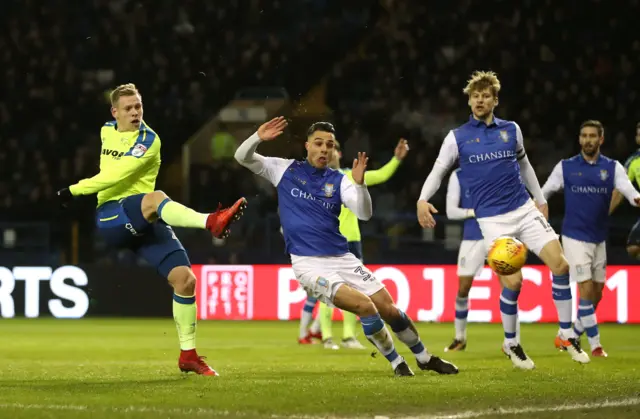 Derby County"s Matej Vydra (left) has a shot at goal