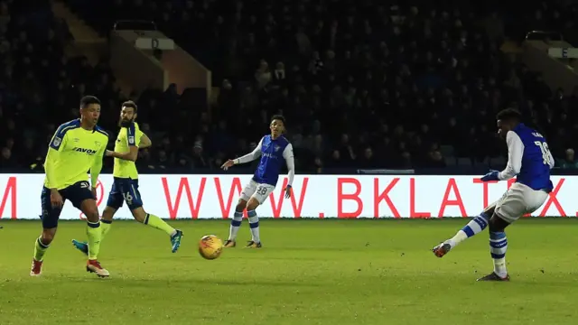 Lucas Joao of Sheffield Wednesday scores the opening goal