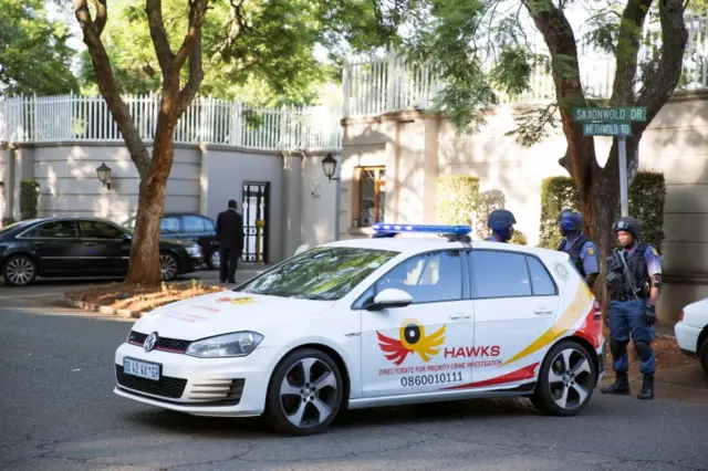 Police close off roads around the home of the Gupta family, friends of President Jacob Zuma, in Johannesburg, South Africa, February 14, 2018.