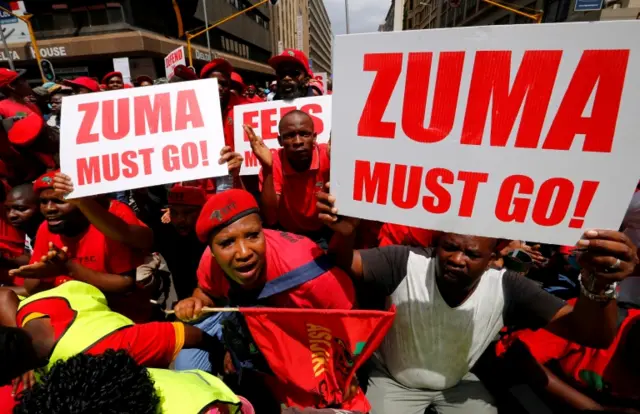 Protestors call for the removal of President Jacob Zuma outside court in Pretoria, South Africa, November 2, 2016.