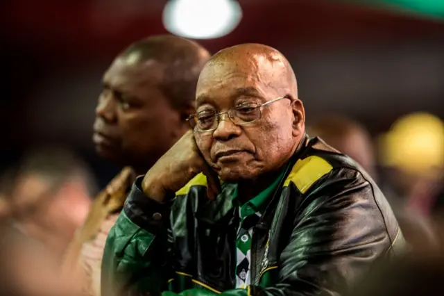 President of South Africa, Jacob Zuma, listens to the closing speech of newly-elected African National Congress President, Cyril Rampahosa, on the final day of the 54th ANC conference at the NASREC Expo Centre in Johannesburg.