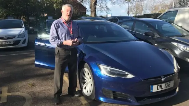 Richard Mear with electric car