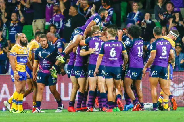 Melbourne Storm celebrate a try