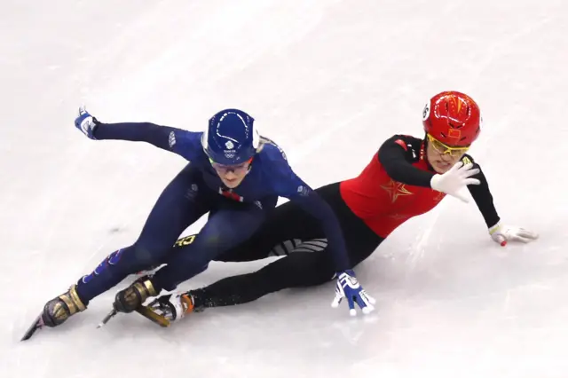 Great Britain's Elise Christie crashes out