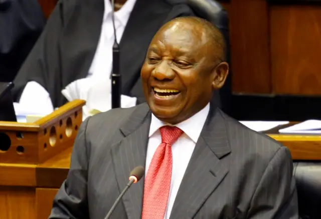 President of South Africa Cyril Ramaphosa smiles as he addresses MPs after being elected president in parliament in Cape Town, South Africa, February 15, 2018.