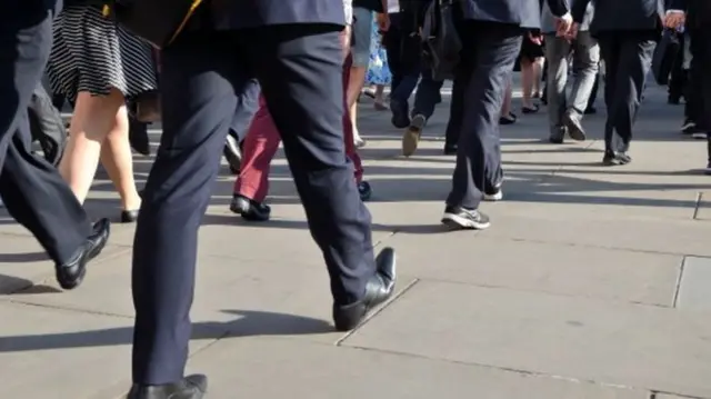 People walking on a pavement