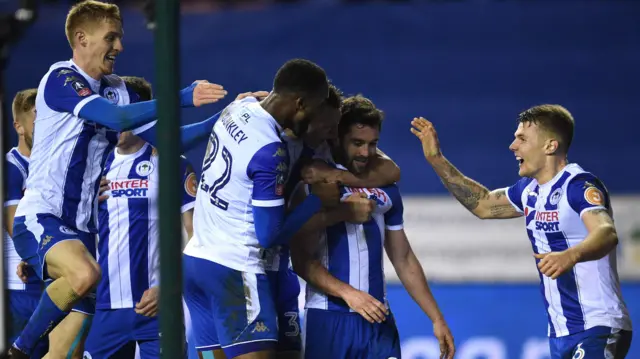 Wigan players celebrate