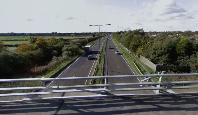 The A63 viewed from a foot bridge from above.