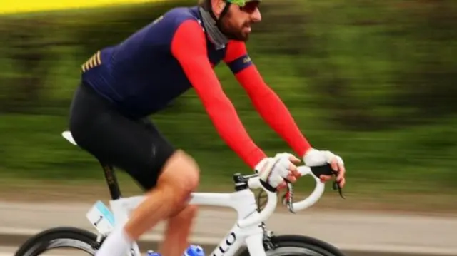 Sir Bradley Wiggins taking part in the time trial on the A63.