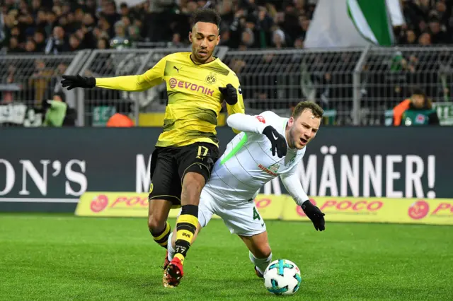 Pierre-Emerick Aubameyang of Dortmund (l) and Philipp Bargfrede of Bremen fights for the ball during the Bundesliga match between Borussia Dortmund and SV Werder Bremen at Signal Iduna Park on December 9, 2017 in Dortmund, Germany
