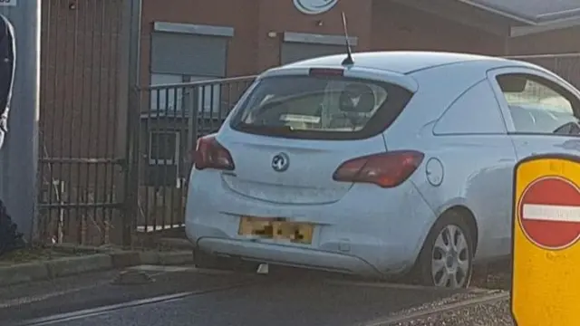 Car stuck on tram track