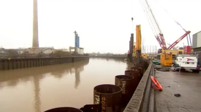 Hull's Bankside with a crane and machinery on it.