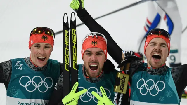 Germany's nordic combined medallists Eric Frenzel (bronze), Johannes Rydzek (gold) and Fabian Riessle (silver)