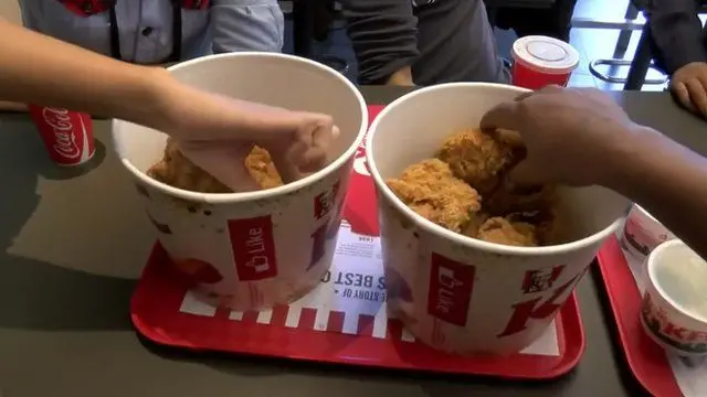 Two KFC buckets of chicken wings