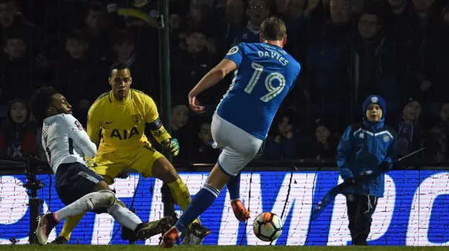 Steven Davies scores Rochdale's equaliser against Tottenham