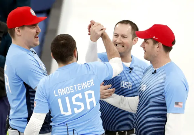 USA curling team celebrate