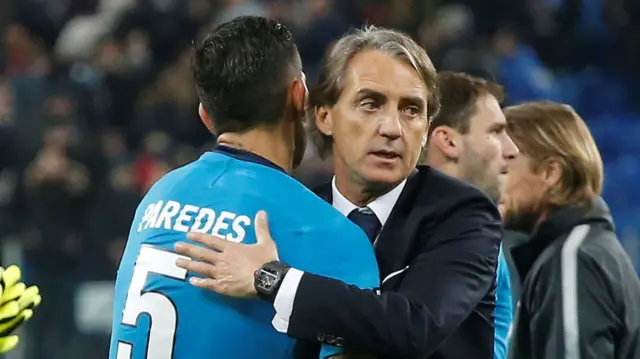 Zenit coach Roberto Mancini congratulates his players