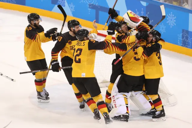 Germany celebrate their win over Canada