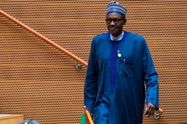 Nigeria's President Muhammadu Buhari walks after speaking at the opening of the Ordinary Session of the Assembly of Heads of State and Government during the 30th annual African Union summit in Addis Ababa on January 28, 2018