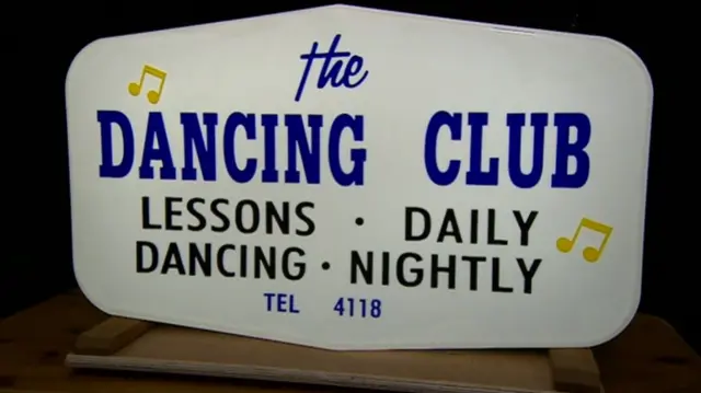 The Dancing Club sign