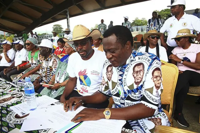 People take part in the last day of official campaigning for incumbent President and Presidential candidate Teodoro Obiang Nguema Mbasogo ahead of the first round of presidential elections in the capital Malabo on April 22, 2016