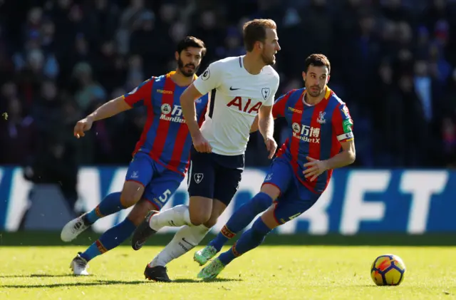 Harry Kane in action with Crystal Palace"s Luka Milivojevic and James Tomkins