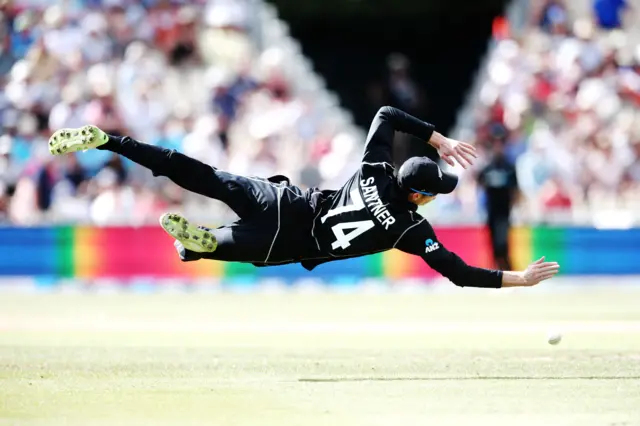 Mitchell Santner of New Zealand