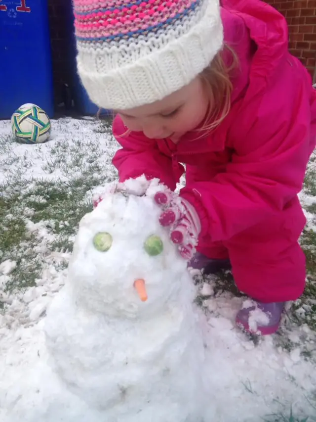 Little hattie's first snowman