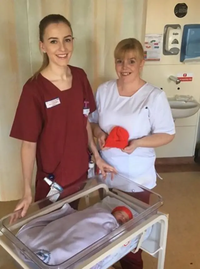 midwife Polly Whyman and healthcare assistant Bev Luke with baby Rocco