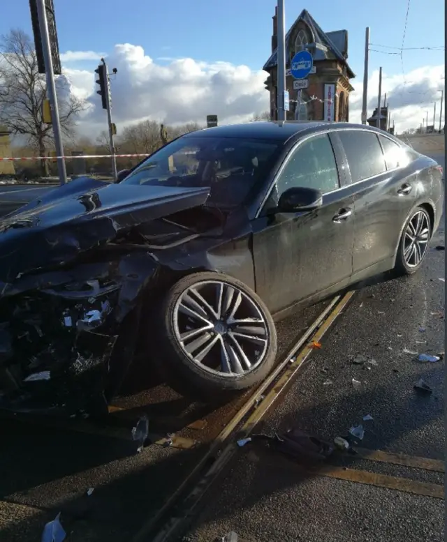 Car crashes into tram