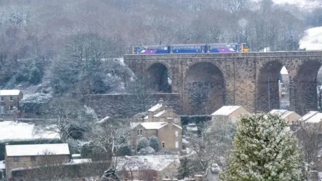 A train crosses Denby Dale viaduct