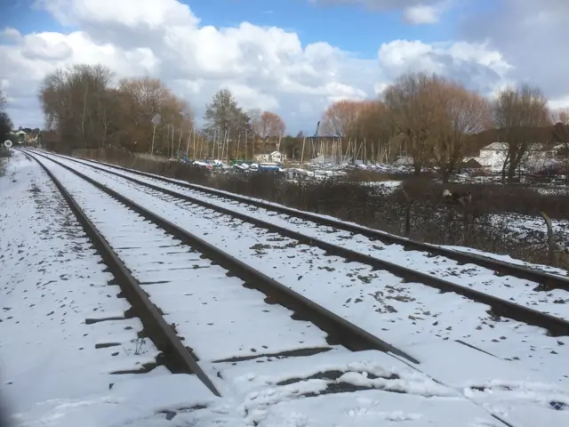 Snow on the rail tracks at Woodbridge