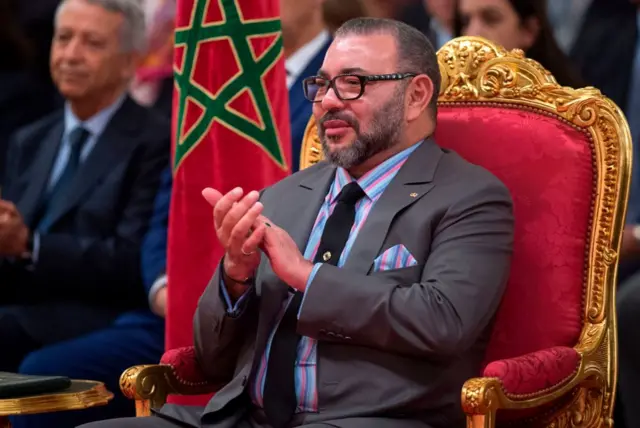 Morocco's King Mohammed VI attends a signing ceremony between Morocco and France's top car manufacturers at the Royal Palace in Casablanca on December 11, 2017.