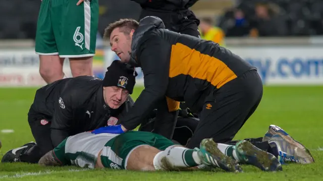 Barnsley's Adam Jackson receives treatment