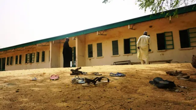 Sandals are strewn in the yard of the Government Girls Science and Technical College staff quarters in Dapchi, Nigeria, on February 22, 2018