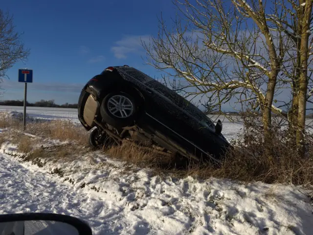 Car in ditch in Mendlesham