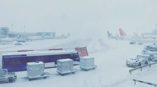 Glasgow Airport covered in snow