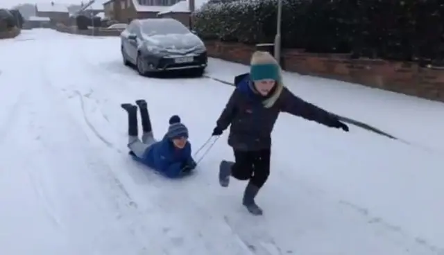 Children in snow in Rotherham