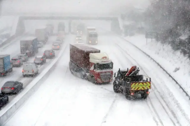 A lorry is pulled off to the side of the road on the M80 Haggs in Glasgow after getting stuck