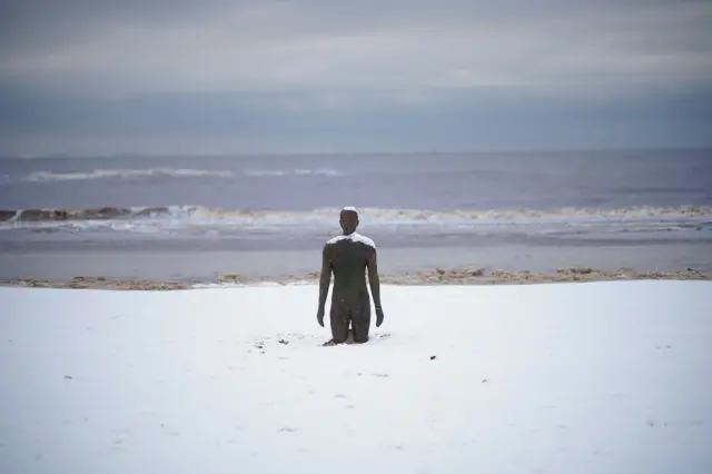 Antony Gormley's art installation 'Another Place' at Crosby Beach, Merseyside